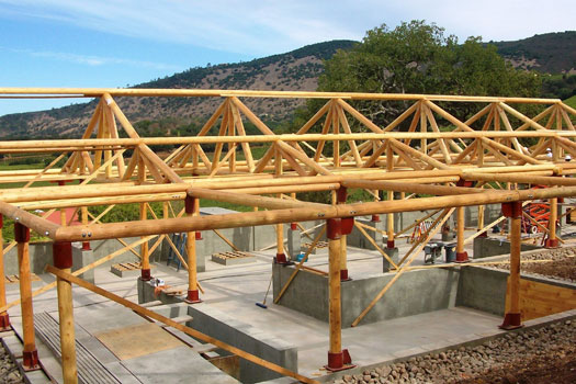 post and beam structure under construction at california winery